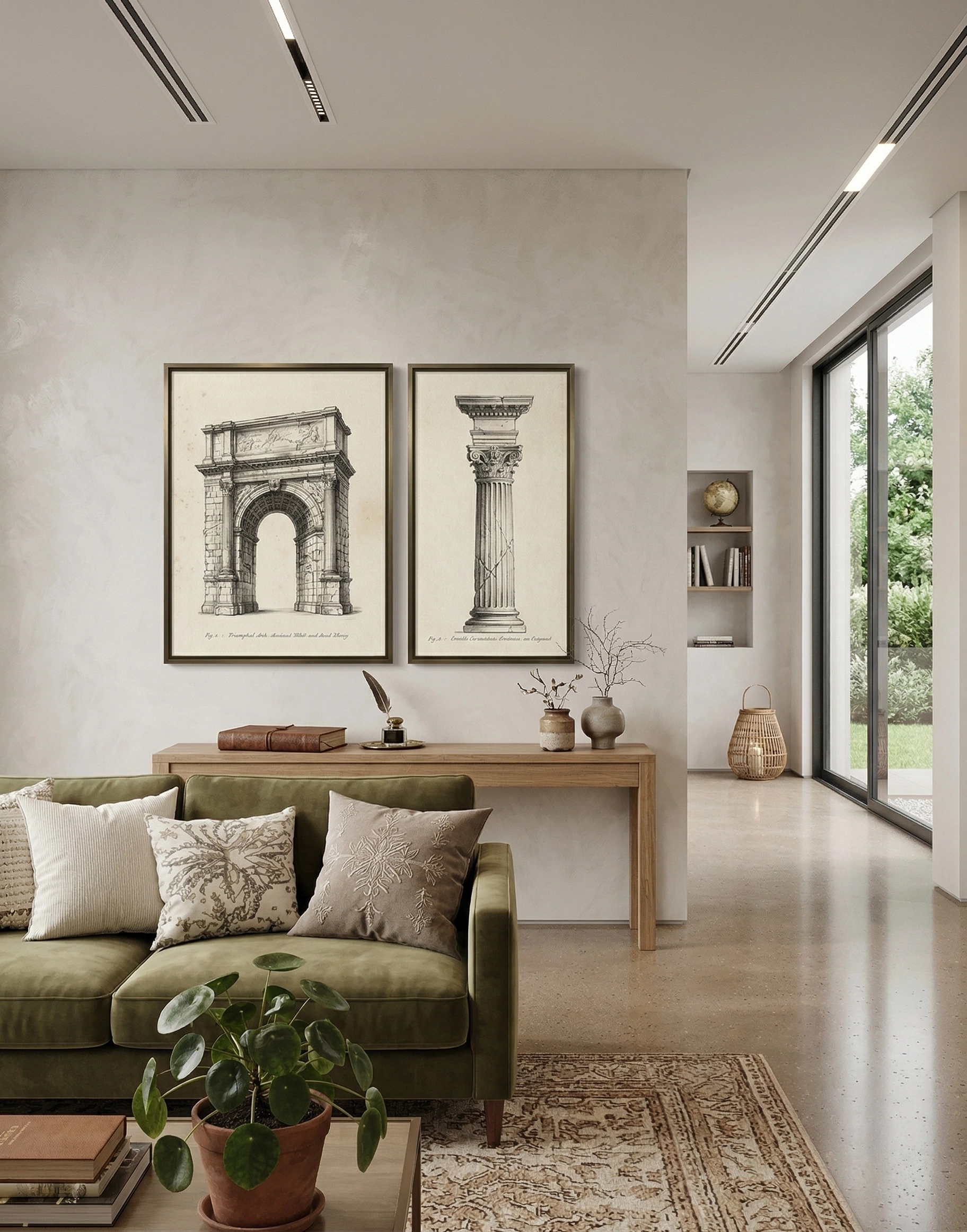 An elegant living room with a green velvet sofa, styled with two Roman architectural prints above a wooden console table.